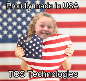 little girl holding USA pillow and American flag-TCS Technologies made in USA