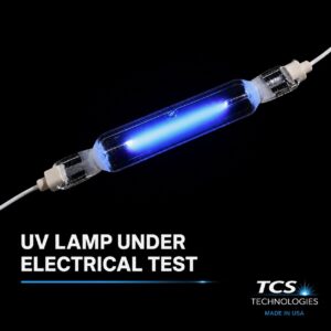 UV lamp glowing blue during electrical testing prior to final inspection.